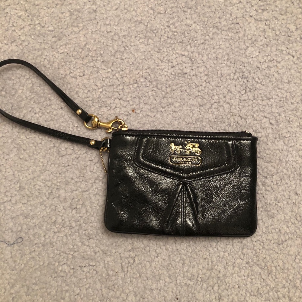 Black and gold coach wristlet